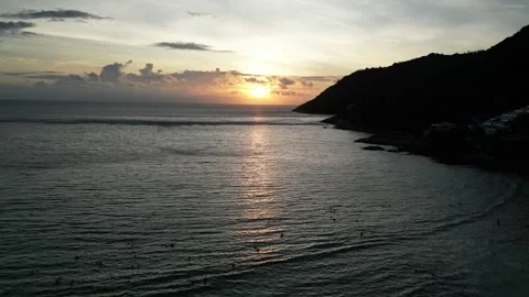 Sunset time with waves crashing on tropical sea Video stock 304660459