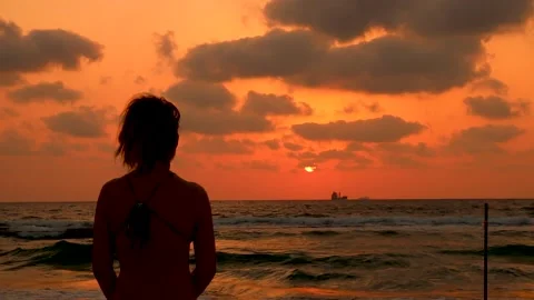 Sunset time- woman Stock Footage 155541806