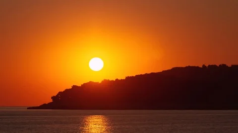 Sunset Timelapse 4k - Sun Goes Down Time Lapse - Ocean Island Silhouette Stock Footage 119429886