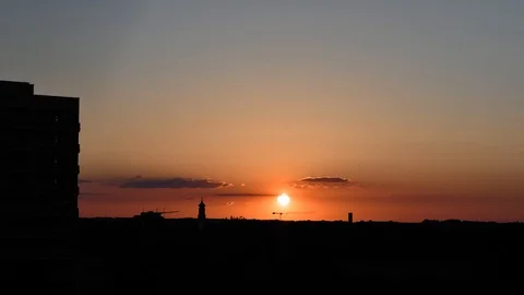 Sunset timelapse on an almost clear sky in the city of Munich, Germany 스톡 동영상 120539543