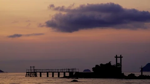 Sunset timelapse behind an ocean island dock in Palawan, Philippines Stock Footage 124997291