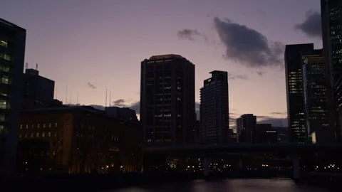 Sunset timelapse in city centre of Osaka, Japan - 4k Stock-Footage 299596287
