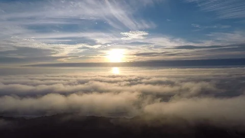 Sunset timelapse of clouds above the ocean Stock Footage 98264831