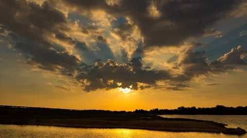 A sunset timelapse with clouds Video stock 85517579