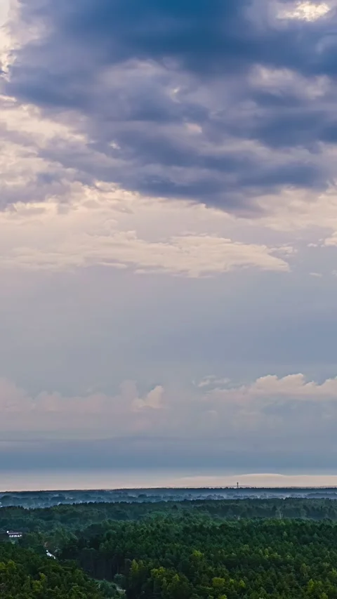 Sunset Timelapse of Clouds Over Endless Forest and Misty Horizon Stock Footage 342471655