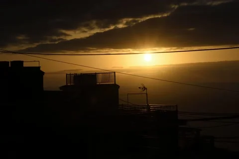 Sunset timelapse. Cloudy day. Clouds passing by. Urban shot. Stock Footage 163960963
