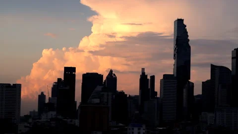 Sunset timelapse concept showing changing cloud formations above Bangkok's .. Stock Footage 348569708