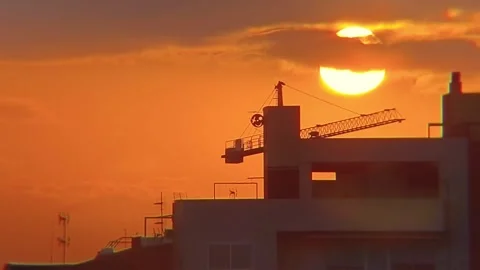 Sunset Timelapse with Construction Crane and City Silhouette Video stock 331161940