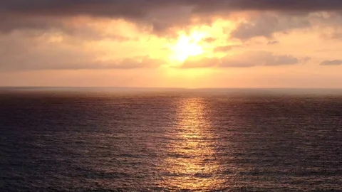 Sunset Timelapse footage Clouds Moving sunset over the sea Stock Footage 115021461