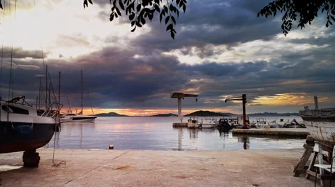 Sunset timelapse in harbor with pier Stock Footage 39900027