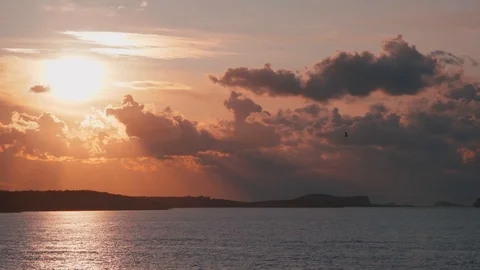 Sunset timelapse Ibiza behind the clouds Stock Footage 124782376