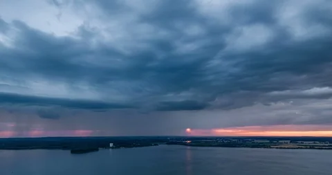 Sunset Timelapse on lake with dark clouds Stock Footage 112621751