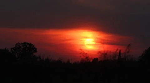 Sunset timelapse on a large meadow with slow camera pan 4K 動画素材 63371957