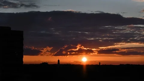 Sunset timelapse with lots of clouds and clouds in the sky in Munich, Germany Stock Footage 120539988