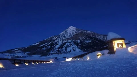 Sunset timelapse low angle looking across bridge at Mount Crested Butte Stock Footage 105172863