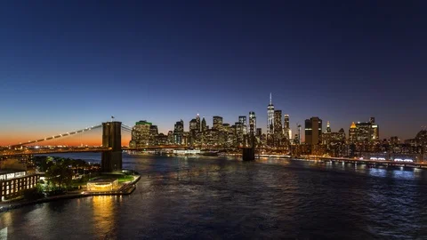 Sunset timelapse of lower Manhattan with Brooklyn bridge, New York. USA 库存影片 88914899