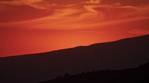 Sunset timelapse in the mountains with passing clouds, sunset mountain landscape Stock Footage 248286916