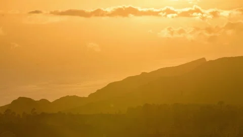 Sunset timelapse with mountains silhouette and ocean Stock Footage 154505878