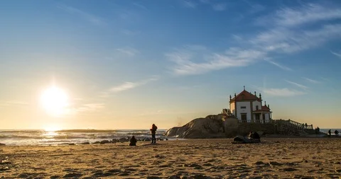 Sunset Timelapse over the Capela do Senhor da Pedra in Miramar, Portugal 4K Stock Footage 127777149