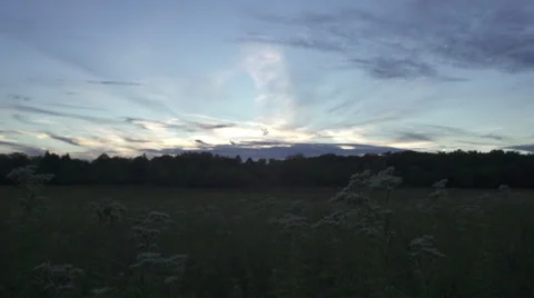 Sunset timelapse over field Stock Footage 29665028
