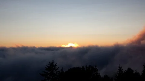 Sunset Timelapse over fog Stock Footage 98696722