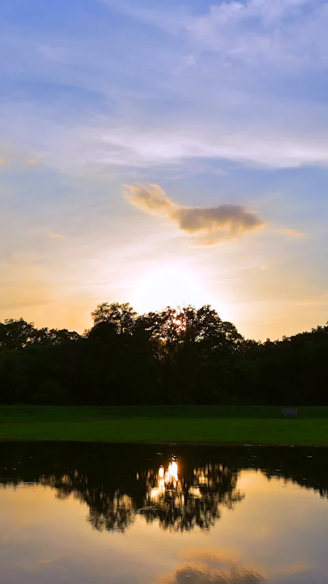 Sunset Timelapse Over Lake with Cloud Reflections Stock Footage 341994232