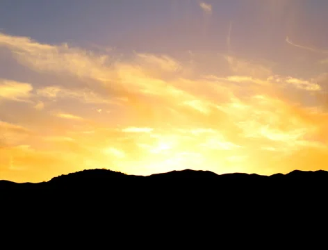 Sunset timelapse over mountain silhouette - 4k 24p Stock Footage 6069953