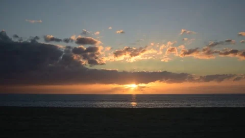 Sunset timelapse over the Pacific Ocean Stock Footage 73307688