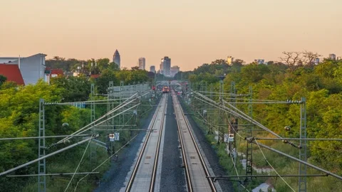 Sunset timelapse over Riedbahn railway and Frankfurt skyline Germany Stock Footage 336101588
