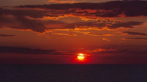 Sunset timelapse over the sea Vídeos de archivo 133647740