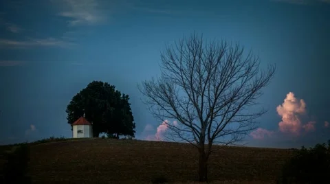 Sunset timelapse over a small chapel slovakia Stock Footage 65393937