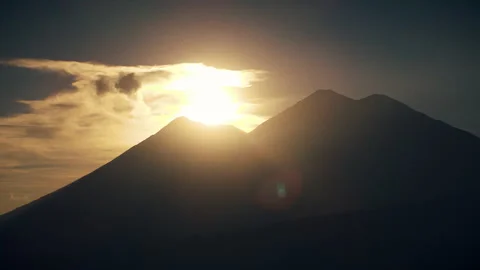 Sunset timelapse over volcanoes Video stock 259088211