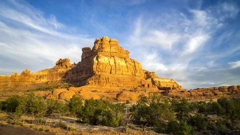 Sunset Timelapse of a Red Sandstone Butte in Canyonlands National Park Stock Footage 128986036