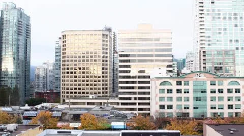 Sunset timelapse reflected off of office buildings Stock Footage 8908325