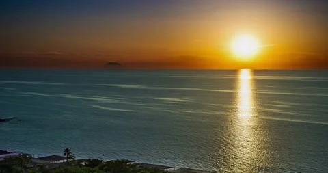 Sunset timelapse seen from a terrace in Tropea (Calabria). In the background  動画素材 254596718