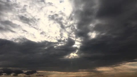 Sunset timelapse shows drifting clouds across partly cloudy sky - Twilight Sky Stock Footage 339642961