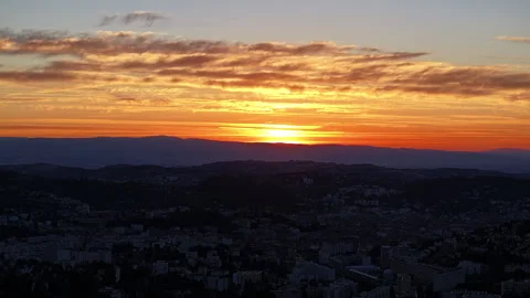 Sunset Timelapse With Sun Setting Behind Hills Over City Stock Footage 346180101