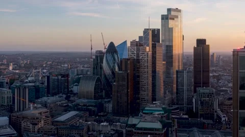 Sunset timelapse view of the urban skyline at the City of London Stock Footage 267678847