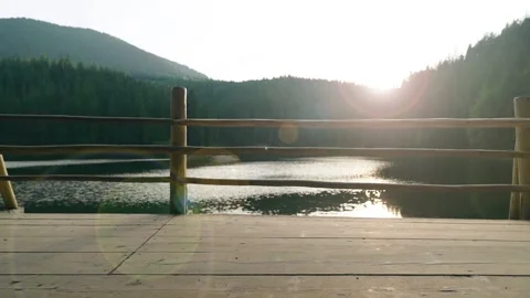 Sunset timelapse with view on volcanoes and lake. No Clouds, the sun is setting Stock Footage 211807161