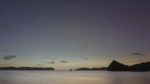 Sunset timelapse with yacht in the background Stock Footage 148082598