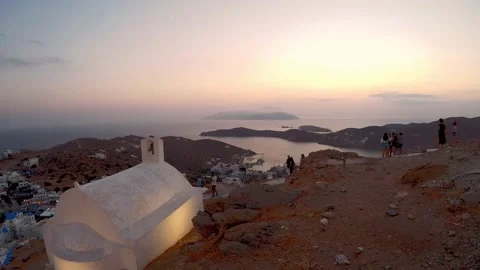 The sunset from the top of a hill with its three churches above Chora of Io.. Video stock 230227763