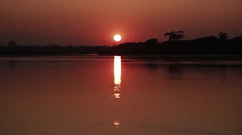 Sunset tracking shot from a boat 1 Stock Footage