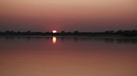 Sunset tracking shot from boat 2 Stock Footage 48160874