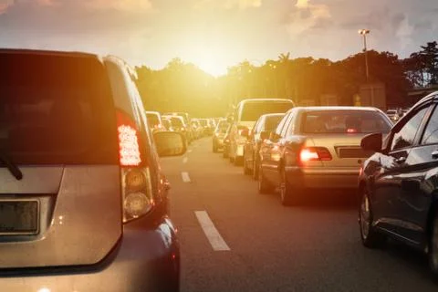 Sunset Traffic jam in the middle of the highway Stock Photos