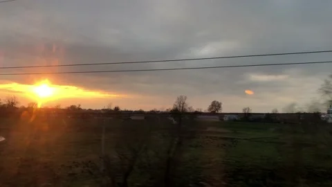 Sunset from the train window Stock Footage 106490027