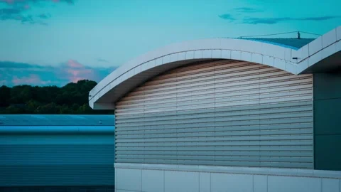 Sunset transition timelapse of warehouse building in england uk Stock Footage 244743550