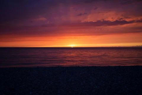 Sunset on Tréport beach in Normandy Stock Photos