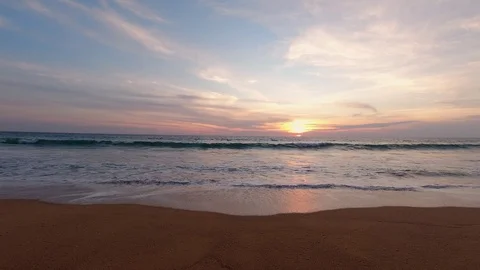 Sunset on a tropical beach Stock Footage 128333098