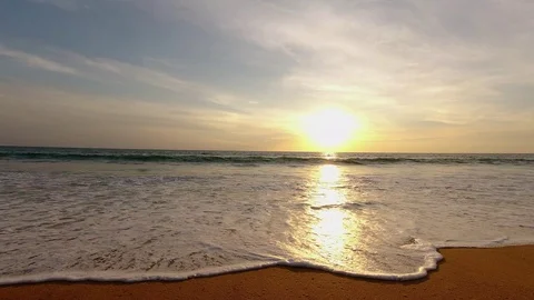 Sunset on a tropical beach  Stock-Footage 128333102