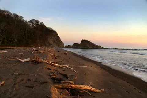 Sunset on a tropical beach Stock Photos
